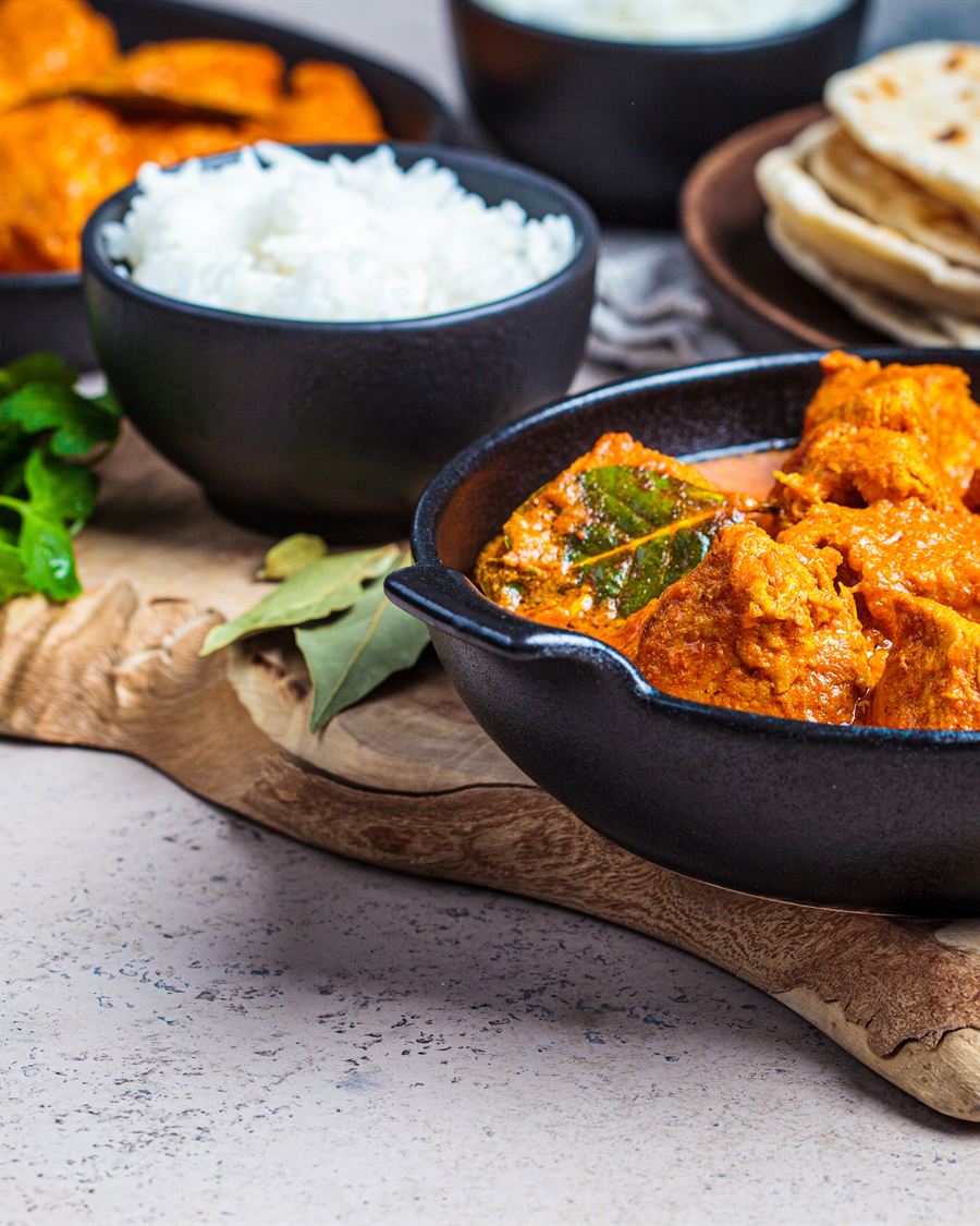Butter chicken with steamed rice and flatbread